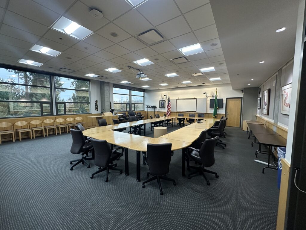 UW1-280 Board Room with leather back chairs in a conference style layout