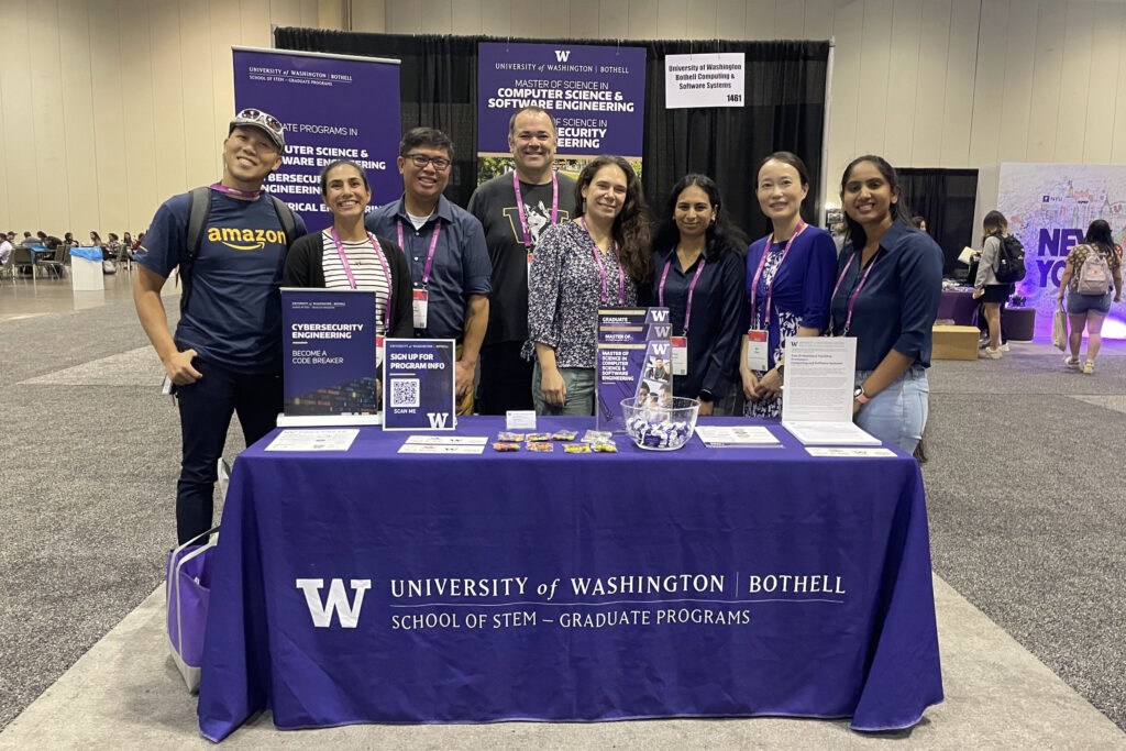 Ŷĳs, faculty and staff at the University of Washington Bothell School of STEM Division of Computing & Software Systems booth representing STEM Graduate Programs in the GHC Expo Hall